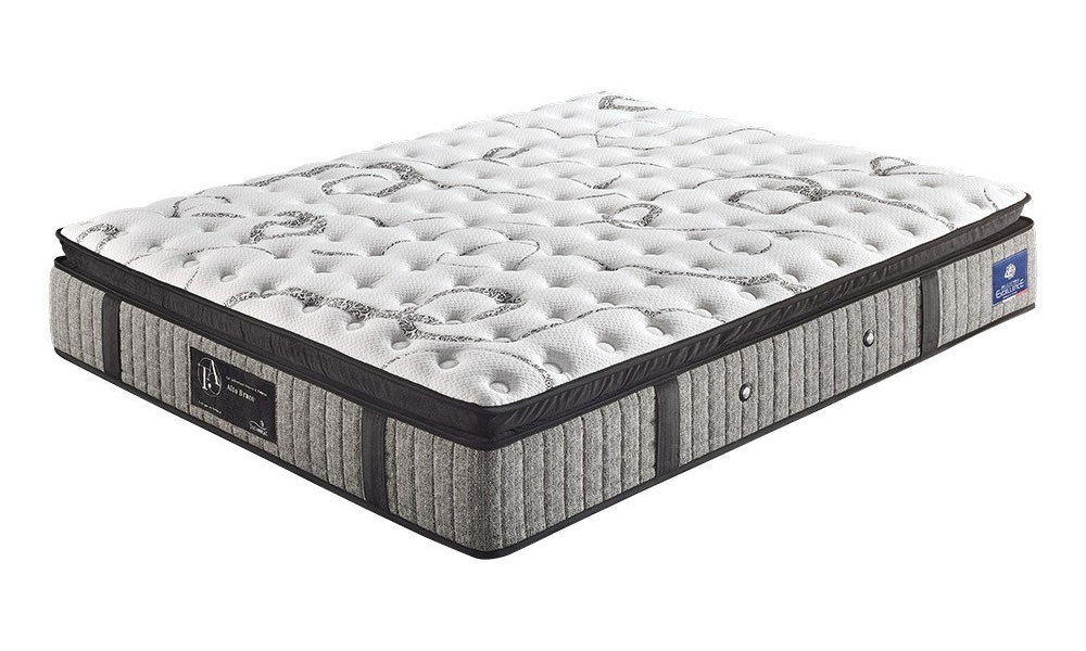 Un matelas moelleux et matelassé avec un dessus blanc à motifs et des côtés gris, doté de poignées en tissu et de boutons latéraux, offre une qualité supérieure pour sa conception. Canape Paris by Atelier Bis