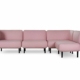 Découvrez la quintessence de la qualité avec ce canapé sectionnel modulaire rose, doté de pieds noirs élégants et posé sur un fond blanc immaculé, parfait pour n'importe quelle salle d'exposition. Canape Paris by Atelier Bis
