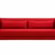 Canapé moderne rouge au design minimaliste et deux coussins, présenté sur un fond blanc, tel que vu dans notre showroom. Canape Paris by Atelier Bis