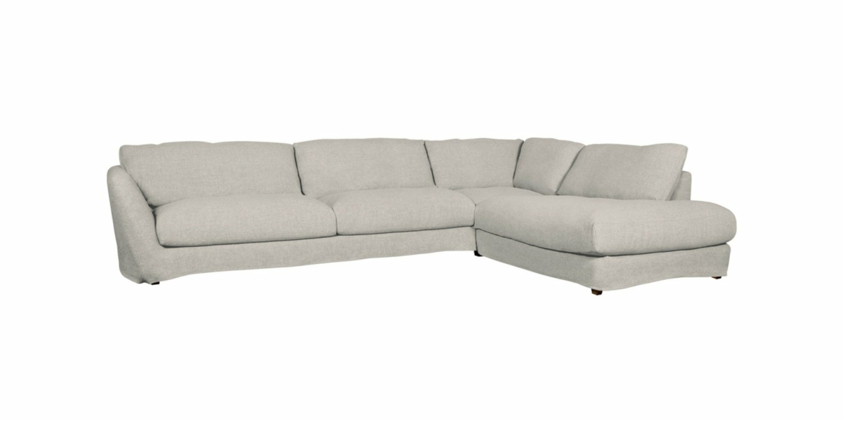 Canapé gris clair en forme de L avec coussins moelleux, présenté sur fond blanc. Canape Paris by Atelier Bis