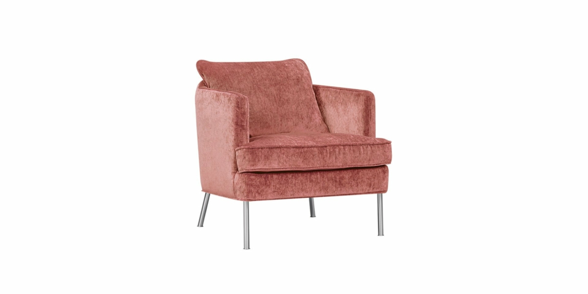 Un fauteuil moelleux en velours rose ressemblant à un canapé chic, avec un siège rembourré et des pieds en métal élégants, vu sous un léger angle, rappelant l'élégance d'un appartement parisien. Canape Paris by Atelier Bis