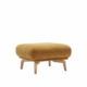 Un pouf rembourré jaune moutarde avec des pieds en bois clair se dresse élégamment sur un fond blanc, ajoutant une touche de chic de showroom parisien à n'importe quelle pièce. Canape Paris by Atelier Bis