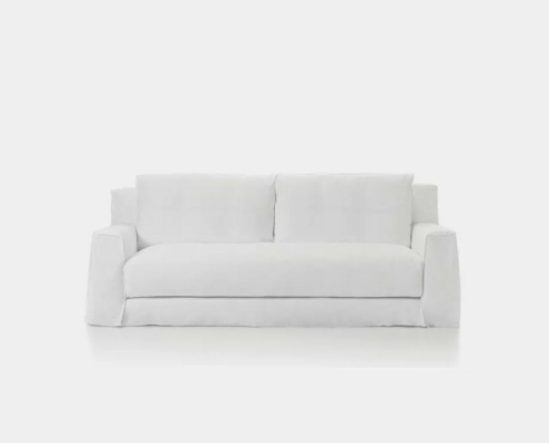 Ce canapé blanc élégant et moderne est doté d'accoudoirs carrés et de coussins moelleux, mettant parfaitement en valeur sa qualité supérieure. Idéal pour une salle d'exposition élégante ou votre espace de vie. Canape Paris by Atelier Bis