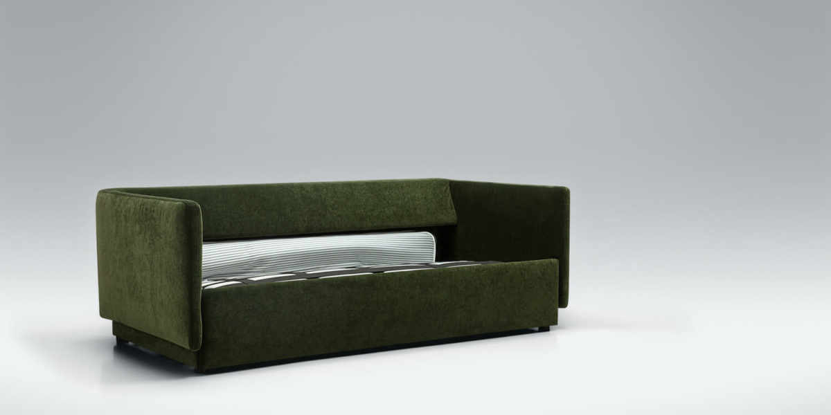 Canapé convertible en lit Colin en vert dans un salon aux tons naturels Le canapé Colin en vert s'intègre parfaitement dans un salon aux tons naturels, ajoutant une touche de fraîcheur et de vitalité à l'espace.