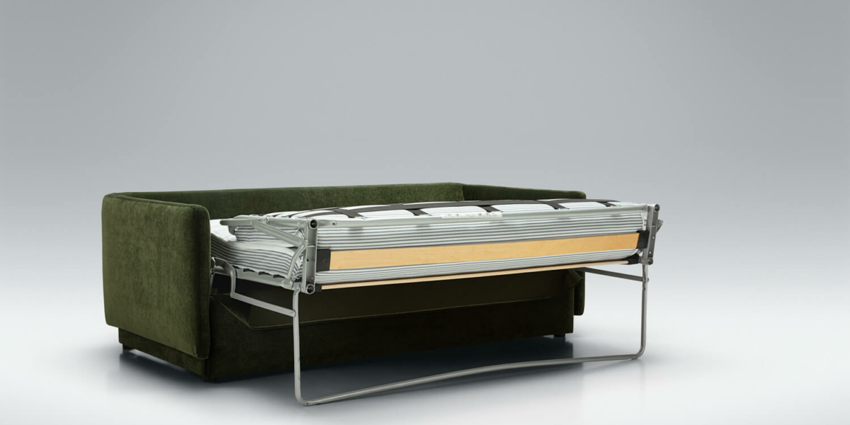 Canapé convertible en lit Colin en vert avec des coussins beige dans un intérieur scandinave Dans un intérieur de style scandinave, le canapé Colin en vert est rehaussé de coussins beige pour créer une atmosphère douce et épurée.