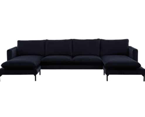 Canapé bleu foncé en forme de L avec une chaise longue à gauche, présentant une qualité exceptionnelle sur fond blanc. Canape Paris by Atelier Bis